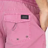 Short de baño Volcom Swell color rosa con cintura elástica y cordón ajustable.