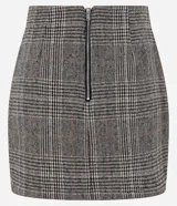 Minifalda de polivelour con estampado de cuadros en tonos grises y marrones.