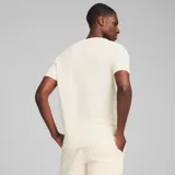 Remera Puma Essentials Elevated Tee color crema, de corte clásico y manga corta.