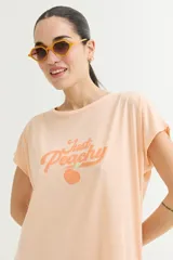 Vestido corto color verde oliva con estampado de dos rostros en color blanco.