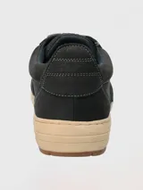 Championes urbanos Hush Puppies modelo Draper, color azul marino, confeccionados en cuero, con cordones grises, plantilla Smart Foam® y suela de goma color beige.