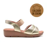 Sandalias de cuero negro con plataforma baja y tira elástica estampada en el empeine.