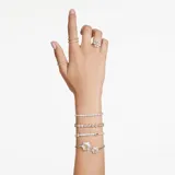 Brazalete rígido abierto bañado en rodio con dos flores de Swarovski Zirconia amarillas y transparentes.