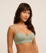 Soutien sin breteles color verde claro, confeccionado en poliamida texturizada con acabado seamless. Tiene breteles removibles y ajustables, copa y cierre en la espalda.