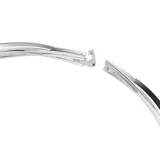 Gargantilla con varias bandas bañadas en rodio y en tono oro, con Swarovski Zirconia transparentes en engaste de canal y de garra. Entre las bandas se han colocado cristales transparentes.