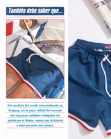Shorts de baño azul marino con vivos blancos y rojos, edición 2024, diseñados y confeccionados artesanalmente en Uruguay.