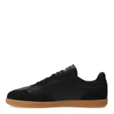 Championes urbanos Umbro color negro con detalles en cuero sintético y suela marrón.