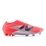 Championes de fútbol New Balance Furon Elite V8, color coral con detalles en plateado y azul marino.