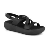 Sandalias negras de cuero Usaflex con plataforma, tiras cruzadas y ajuste con velcro.