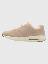 Zapatillas Hush Puppies Brandhall color beige de cuero descarne, con suela de goma EVA con tecnología Air.