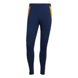 Calza deportiva azul marino de poliéster reciclado, con tecnología Aeroready, corte ajustado, cintura elástica con cordón, bolsillos laterales, puños con cremallera y escudo del Real Madrid termotransferido. Presenta paneles laterales con diseño de rayas horizontales en color naranja.