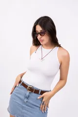 Body ajustado de lycra con estampado animal print de leopardo y cuello halter.