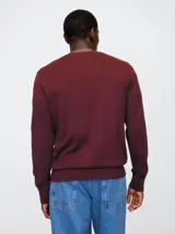 Buzo de algodón gris con escote en V y logo de Gap bordado en el pecho.