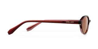 Lentes de sol con montura ovalada de acetato color marrón oscuro (maroon) y lentes de color marrón.