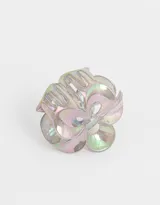 Broche para el pelo en forma de flor holográfica.