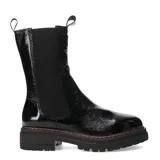 Bota chelsea negra de mujer, con elásticos laterales y suela robusta.
