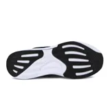 Championes deportivos Diadora modelo Rush, color negro con logo y detalles en blanco. Presentan una capellada de malla transpirable, cordones bicolores (negro y blanco) y una suela gruesa de espuma blanca.