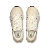 Championes de running On Cloudsurfer 2, color beige con detalles en blanco y negro.
