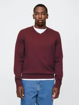 Buzo de algodón gris con escote en V y logo de Gap bordado en el pecho.