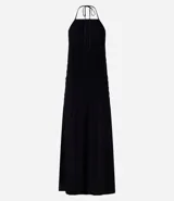 Vestido midi negro con cuerpo en lastex, escote halter con lazo y volado fruncido en el ruedo.