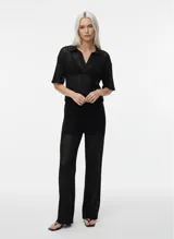 Pantalón negro de punto single jersey con corte wide leg, tiro alto y cintura elástica con cordón ajustable.
