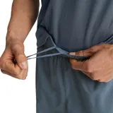 Short de entrenamiento Puma para hombre, color azul grisáceo, con cintura elástica ajustable, tecnología dryCELL y logo estampado en la pierna.