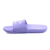 Ojotas rosas con logo de Umbro en blanco en la tira.