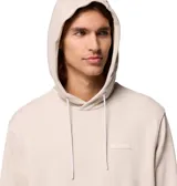 Buzo hoodie Columbia color mostaza con logo estampado en el pecho, bolsillo tipo canguro, puños y cintura acanalados.