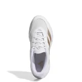 Championes Adidas Gamechaser blancos con detalles en dorado. Zapatillas deportivas con las tres tiras características de Adidas en los laterales.