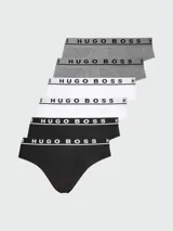 Pack de tres slips Hugo Boss de algodón en colores gris, blanco y negro, con cintura elástica y logo de la marca.