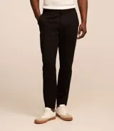 Pantalón de vestir negro para hombre, corte skinny, confeccionado en media malla.
