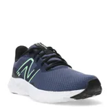Championes de running New Balance 411 V3, color azul marino con detalles en negro y verde agua, capellada de malla transpirable y entresuela de EVA Ground Contact.