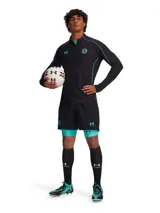 Short deportivo negro con calza interna turquesa, logo de Under Armour y Mansory en la pierna. Ideal para entrenamiento y actividades deportivas.