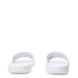 Sandalias Puma Popcat 20 blancas con logo negro.