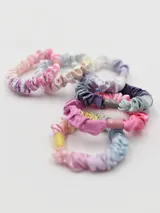 Set de seis gomitas de pelo elásticas forradas en tela con diseño multicolor.