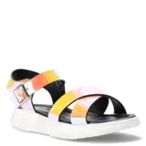 Sandalia de tiras cruzadas color nude con suela blanca y diseño moderno.