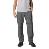 Pantalón de senderismo convertible en short, color negro, con tecnología Omni-Shade™ de protección solar UPF 50 y Omni-Wick™ de secado rápido. Cuenta con cintura parcialmente elástica, cinturón extraíble, bolsillos para manos, bolsillo de seguridad con cremallera, bolsillo cargo con cierre de velcro y detalle de fuelle.
