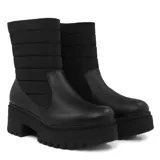 Bota casual Usaflex de cuero negro con caña acolchada y plataforma track.