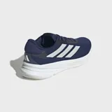 Championes de running Adidas Supernova Ease, color azul marino con las tres franjas características en plateado. Cuentan con una mediasuela gruesa de espuma blanca con tecnología Dreamstrike+.