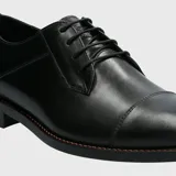 Zapato de vestir formal Hush Puppies modelo Jazz, color negro, confeccionado en cuero.