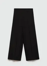 Pantalón culotte color beige de lino y viscosa, con cintura elástica y corte ancho.