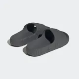 Ojotas Adidas Adilette 22 color gris con diseño ondulado.