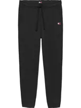 Pantalón de jogging negro de algodón, con cordones ajustables en la cintura, tres bolsillos, bajos elásticos y logo bordado de Tommy Jeans en la parte delantera.