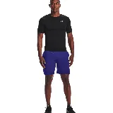 Remera deportiva Under Armour HeatGear negra de calce ajustado, mangas cortas y cuello redondo.