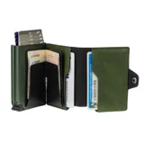 Billetera compacta de cuero genuino color verde con doble caja de aluminio incorporada. Cuenta con sistema de deslizamiento para tarjetas, espacio para billetes y protección RFID.