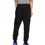 Pantalón de jogging negro con logo de Nike bordado en blanco en el muslo izquierdo.