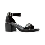Sandalias negras de cuero sintético con taco bajo cuadrado y hebillas plateadas.
