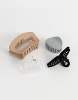 Set de cuatro broches para el pelo de diferentes formas y tamaños.