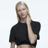 Pulsera plateada con piedras de cristal talla pera engarzadas en garra y cierre oculto con cadena de seguridad.