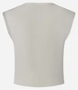 Blusa corta color crudo, de punto acanalado, con cuello redondo y hombros caídos.